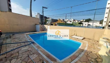 Linda casa com piscina,  com 3 dormitórios à venda, 285 m² por R$ 1.100.000 - Prainha - Caraguatatuba/SP