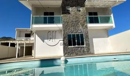 Casa com 6 quartos à venda no Guarda do Cubatão, Palhoça  por R$ 690.000