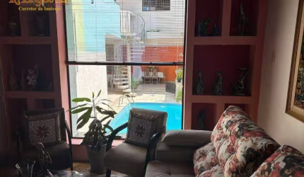 Sobrado com 3 dormitórios à venda, 178 m² por R$ 1.800.000,00 - Pompéia - Santos/SP