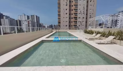 Apartamento com 2 dormitórios à venda, 77 m² por R$ 550.000,00 - Tupi - Praia Grande/SP