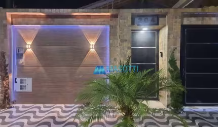 Casa com 4 dormitórios à venda, 250 m² por R$ 1.650.000,00 - Caiçara - Praia Grande/SP