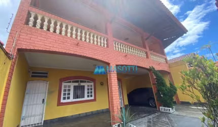 Sobrado com 3 dormitórios à venda, 300 m² por R$ 900.000,00 - Solemar - Praia Grande/SP