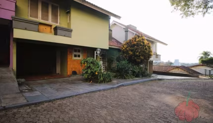 Casa em condomínio fechado com 3 quartos à venda na Rua Padre João Batista Reus, Vila Conceição, Porto Alegre, 201 m2 por R$ 780.000