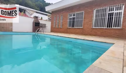 Casa com 4 dormitórios à venda, 420 m² por R$ 1.150.000,00 - Tombo - Guarujá/SP