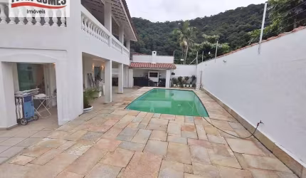 Sobrado com 4 dormitórios à venda, 272 m² por R$ 1.400.000,00 - Guaiuba - Guarujá/SP