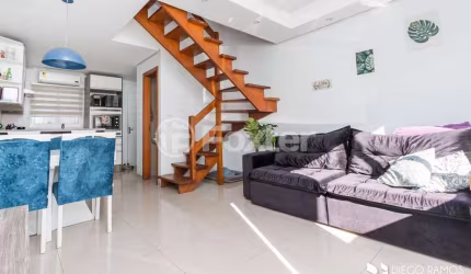 Casa em condomínio fechado com 2 quartos à venda na Rua Capitão Pedroso, 416, Restinga, Porto Alegre, 82 m2 por R$ 245.000