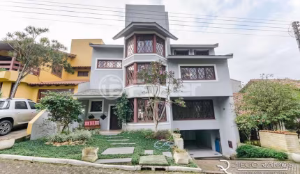 Casa em condomínio fechado com 3 quartos à venda na Rua Tocantins, 869, Lomba do Pinheiro, Porto Alegre, 385 m2 por R$ 1.700.000