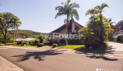 Casa em condomínio fechado com 5 quartos à venda na Avenida da Cavalhada, 5205, Cavalhada, Porto Alegre, 565 m2 por R$ 3.255.000