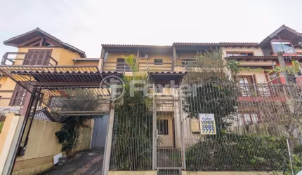 Casa com 5 quartos à venda na Rua Moacyr Godoy Ilha, 242, Espírito Santo, Porto Alegre, 359 m2 por R$ 745.000