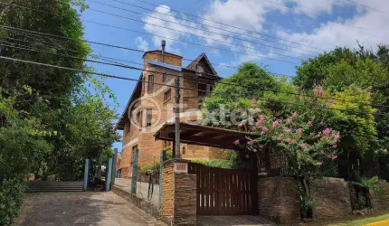 Casa em condomínio fechado com 3 quartos à venda na Rua Canela, Acs 2, São Lucas, Viamão, 144 m2 por R$ 650.000