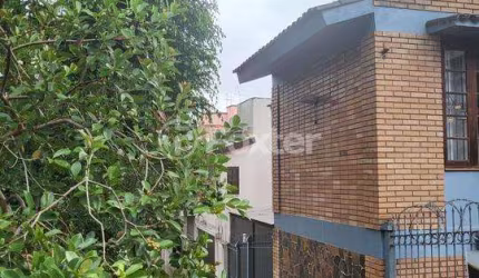 Casa com 3 quartos à venda na Avenida América, 268, Auxiliadora, Porto Alegre, 262 m2 por R$ 1.277.000