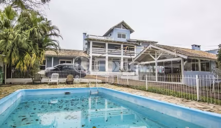 Casa com 4 quartos à venda na Rua Marquês do Maricá, 444, Vila Nova, Porto Alegre, 360 m2 por R$ 1.300.000