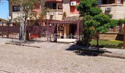 Casa com 3 quartos à venda na Rua Jacundá, 633, Guarujá, Porto Alegre, 156 m2 por R$ 590.000