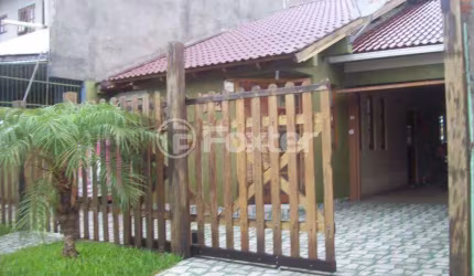 Casa com 3 quartos à venda na Rua César Passarinho, 115, Jardim dos Lagos, Guaíba, 130 m2 por R$ 450.000