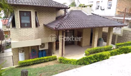 Casa com 3 quartos à venda na Rua Fernando de Andrade Prates, 172, Centro, Viamão, 162 m2 por R$ 680.000
