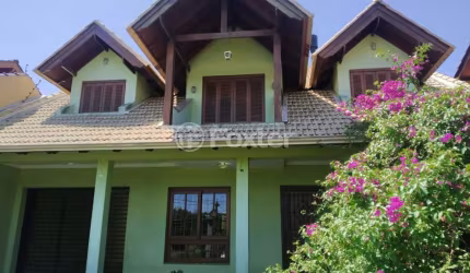 Casa com 3 quartos à venda na Rua Santo Expedito, 233, Parque Santa Fé, Porto Alegre, 306 m2 por R$ 640.000