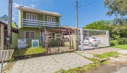 Casa com 3 quartos à venda na Avenida Nossa Senhora de Guadalupe, 970, Hípica, Porto Alegre, 103 m2 por R$ 372.000