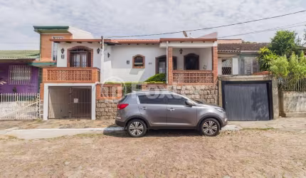 Casa com 3 quartos à venda na Rua Oito, 457, Jardim Carvalho, Porto Alegre, 200 m2 por R$ 485.000