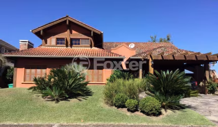 Casa em condomínio fechado com 5 quartos à venda na Avenida Juca Batista, 8000, Belém Novo, Porto Alegre, 431 m2 por R$ 5.500.000