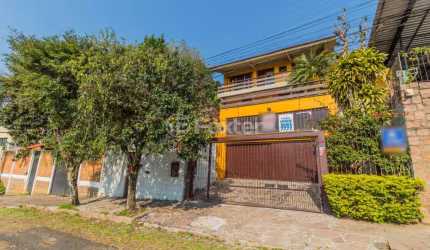 Casa com 3 quartos à venda na Rua Coronel Ruy da Cunha Paim, 35, Nonoai, Porto Alegre, 294 m2 por R$ 899.000