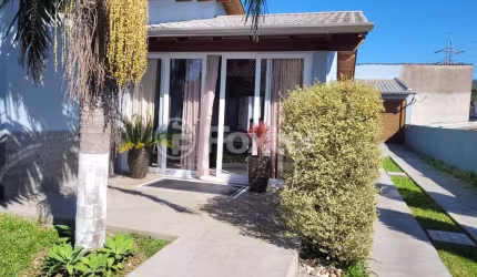 Casa com 3 quartos à venda na Rua Tapuias, 42, Parque Índio Jari, Viamão, 120 m2 por R$ 600.000