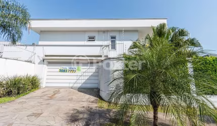 Casa com 3 quartos à venda na Rua País de Gales, 153, Marechal Rondon, Canoas, 245 m2 por R$ 3.000.000