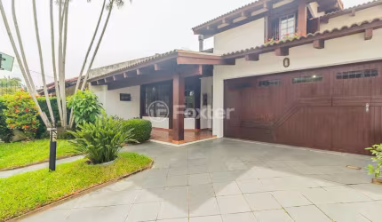 Casa com 5 quartos à venda na Rua Engenheiro Coelho Parreira, 384, Ipanema, Porto Alegre, 238 m2 por R$ 1.300.000