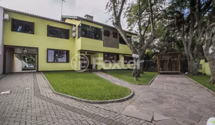 Casa com 5 quartos à venda na Avenida Guaíba, 10468, Ipanema, Porto Alegre, 629 m2 por R$ 3.600.000