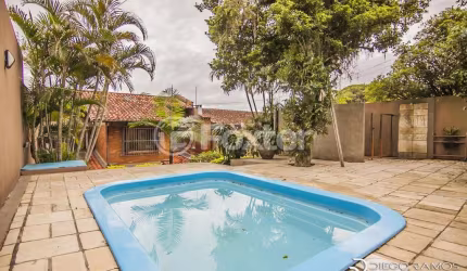 Casa com 3 quartos à venda na Rua Edgar Luiz Schneider, 490, Ipanema, Porto Alegre, 478 m2 por R$ 1.290.000