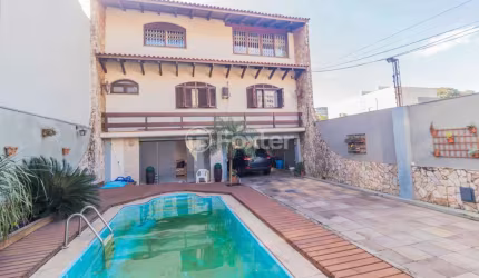 Casa com 8 quartos à venda na Rua Honório Lemos, 306, Vila João Pessoa, Porto Alegre, 442 m2 por R$ 1.270.000