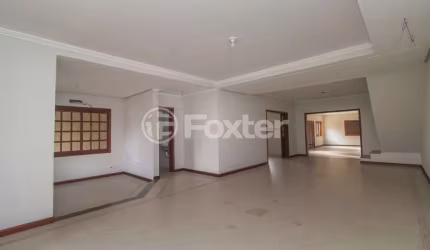 Casa com 3 quartos à venda na Rua Oiampi, 90, Guarujá, Porto Alegre, 388 m2 por R$ 860.000