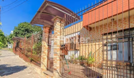 Casa com 5 quartos à venda na Rua Umbú, 566, Passo da Areia, Porto Alegre, 192 m2 por R$ 1.500.000