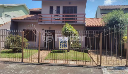 Casa com 4 quartos à venda na Rua Doutor Tancredo Neves, 231, Fátima, Canoas, 250 m2 por R$ 1.000.000