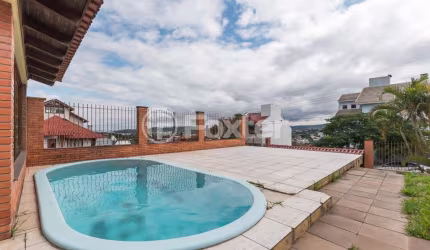 Casa com 4 quartos à venda na Rua Kyve T. Knijnik, 15, Espírito Santo, Porto Alegre, 246 m2 por R$ 1.390.000
