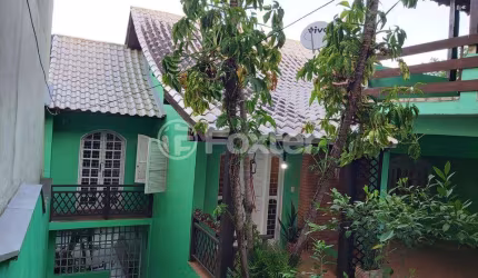 Casa com 3 quartos à venda na Avenida Doutor Rubem Knijnik, 345, Parque Santa Fé, Porto Alegre, 264 m2 por R$ 695.000