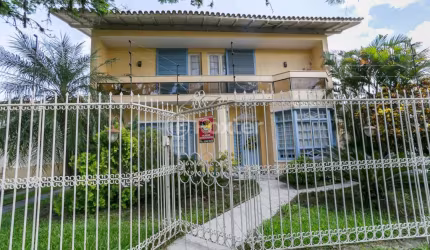 Casa com 3 quartos à venda na Travessa Trindade, 40, Jardim Lindóia, Porto Alegre, 281 m2 por R$ 1.235.000