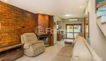 Casa em condomínio fechado com 3 quartos à venda na Rua Louro, 34, Hípica, Porto Alegre, 174 m2 por R$ 750.000