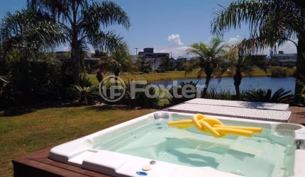 Casa em condomínio fechado com 3 quartos à venda na Rua Rio Divisa, 750, Centro, Xangri-Lá, 267 m2 por R$ 2.223.000