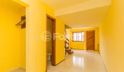 Casa em condomínio fechado com 2 quartos à venda na Rua Hilário Gonçalves Pinha, 120, Hípica, Porto Alegre, 80 m2 por R$ 242.250