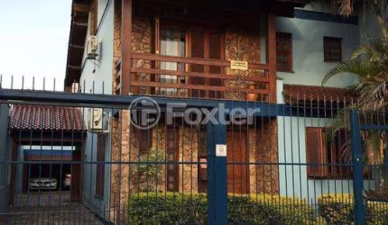 Casa com 4 quartos à venda na Rua Ararás, 344, Sarandi, Porto Alegre, 292 m2 por R$ 1.200.000