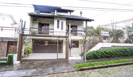 Casa com 3 quartos à venda na Rua José Grimberg, 150, Parque Santa Fé, Porto Alegre, 266 m2 por R$ 890.000