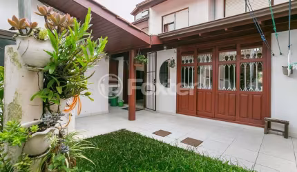 Casa em condomínio fechado com 3 quartos à venda na Avenida Eduardo Prado, 695, Cavalhada, Porto Alegre, 169 m2 por R$ 730.000