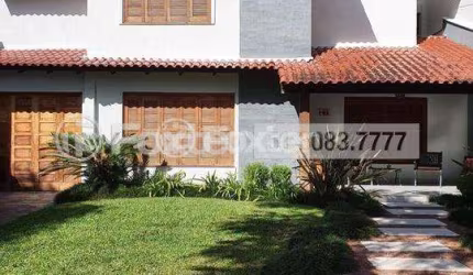 Casa em condomínio fechado com 4 quartos à venda na Avenida Juca Batista, 1200, Hípica, Porto Alegre, 290 m2 por R$ 1.450.000