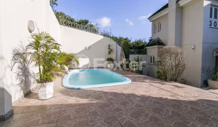 Casa com 3 quartos à venda na Rua Doutor Paulino Guerra, 46, Jardim Itu Sabará, Porto Alegre, 282 m2 por R$ 1.377.500