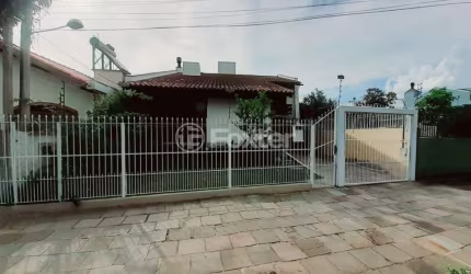 Casa comercial com 3 salas à venda na Rua Xavier da Cunha, 687, Nonoai, Porto Alegre, 260 m2 por R$ 902.500