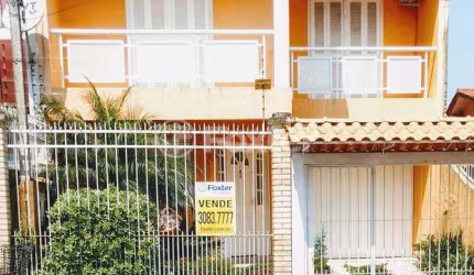Casa com 3 quartos à venda na Rua Tesourinha, 174, Jardim Algarve, Alvorada, 220 m2 por R$ 371.000