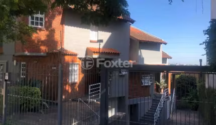 Casa em condomínio fechado com 3 quartos à venda na Rua Padre João Batista Reus, 1700, Vila Conceição, Porto Alegre, 245 m2 por R$ 958.000