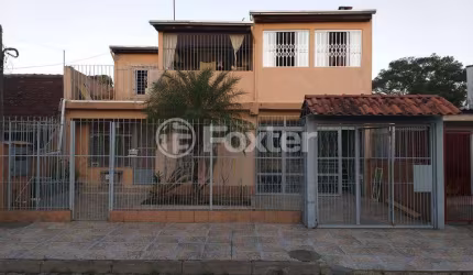 Casa com 4 quartos à venda na Acesso Três, 4258, Restinga, Porto Alegre, 250 m2 por R$ 280.000