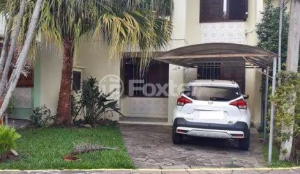 Casa em condomínio fechado com 3 quartos à venda na Avenida Juca Batista, 4115, Hípica, Porto Alegre, 99 m2 por R$ 499.000