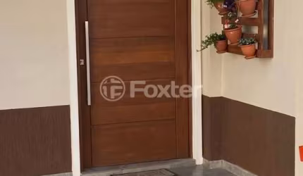 Casa em condomínio fechado com 3 quartos à venda na Rua Antônio Lourenço Rosa, 225, Mato Grande, Canoas, 112 m2 por R$ 435.000
